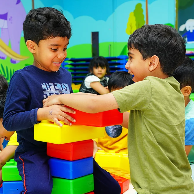 Young learners building together - learning with fun
