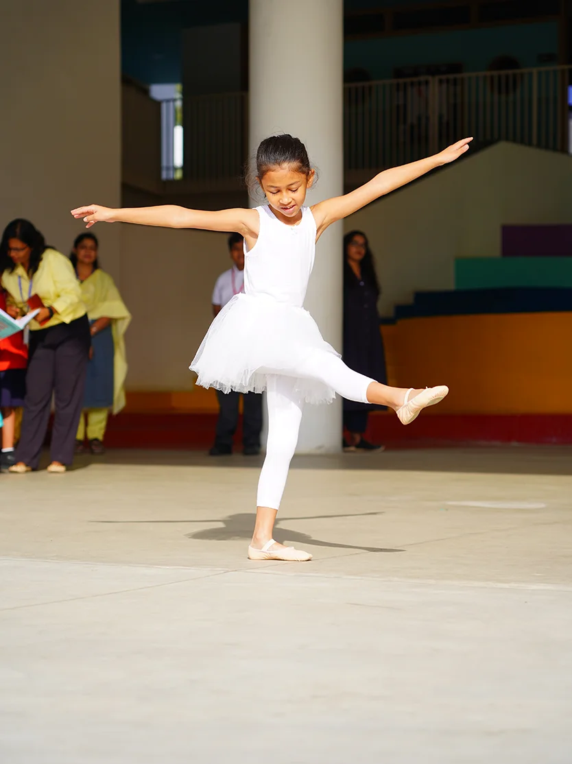 NHIS student performing a ballet routine on stage