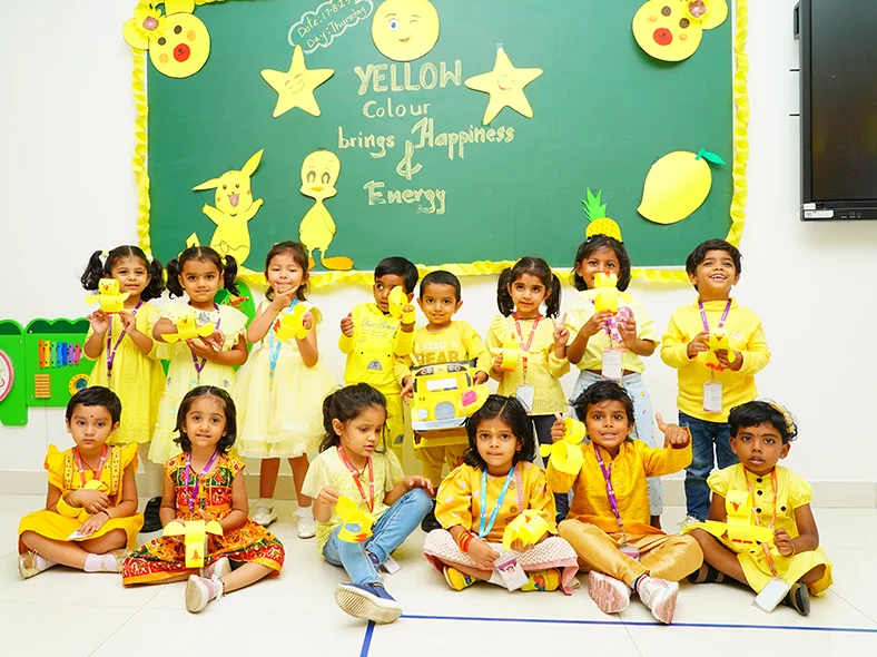 Kindergarten children celebrating Yellow Colour Day at NHIS