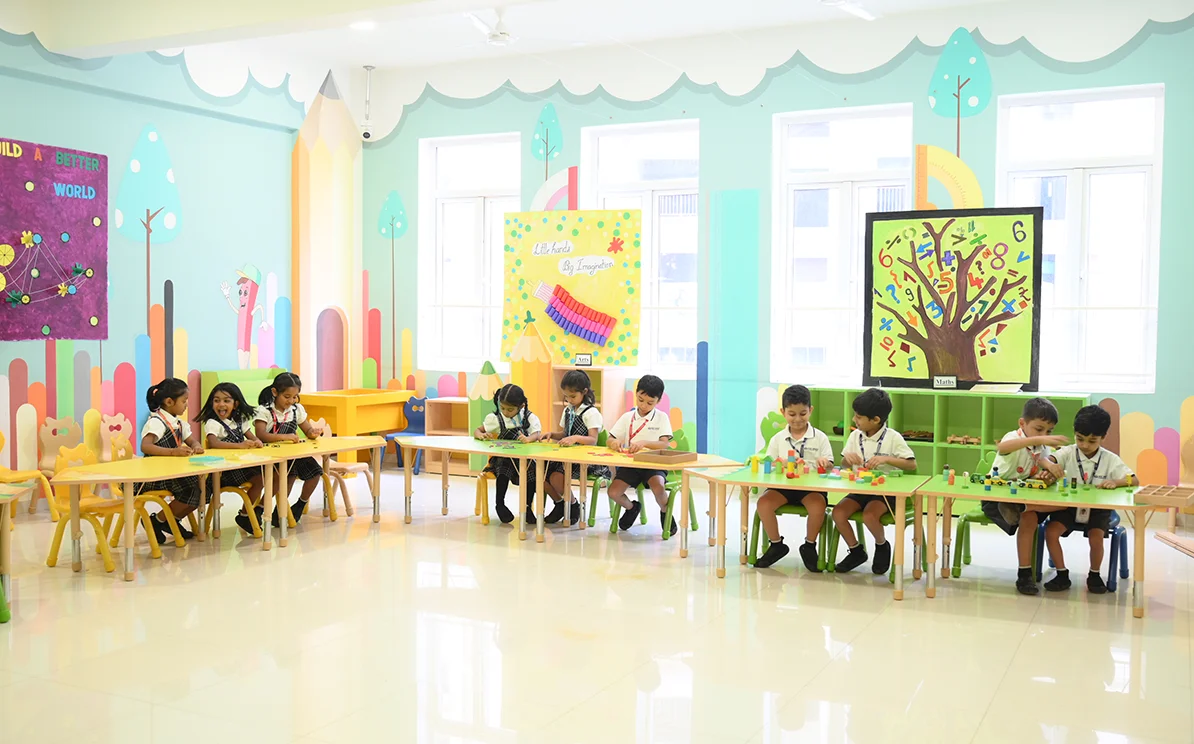 Bright NHIS kindergarten classroom with children at work