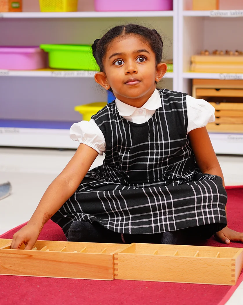 Primary school children learning together at NHIS