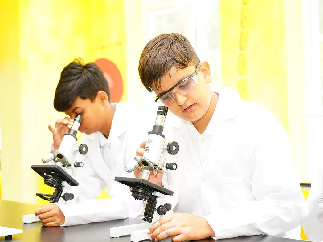 Students working in the NHIS science laboratory