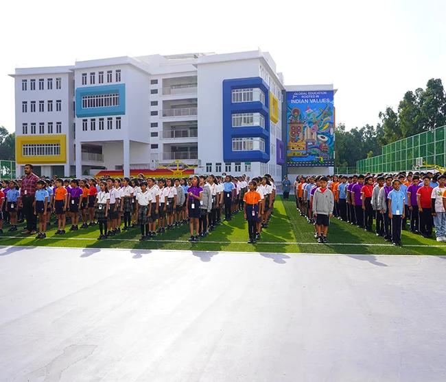 Students at morning assembly on the NHIS grounds